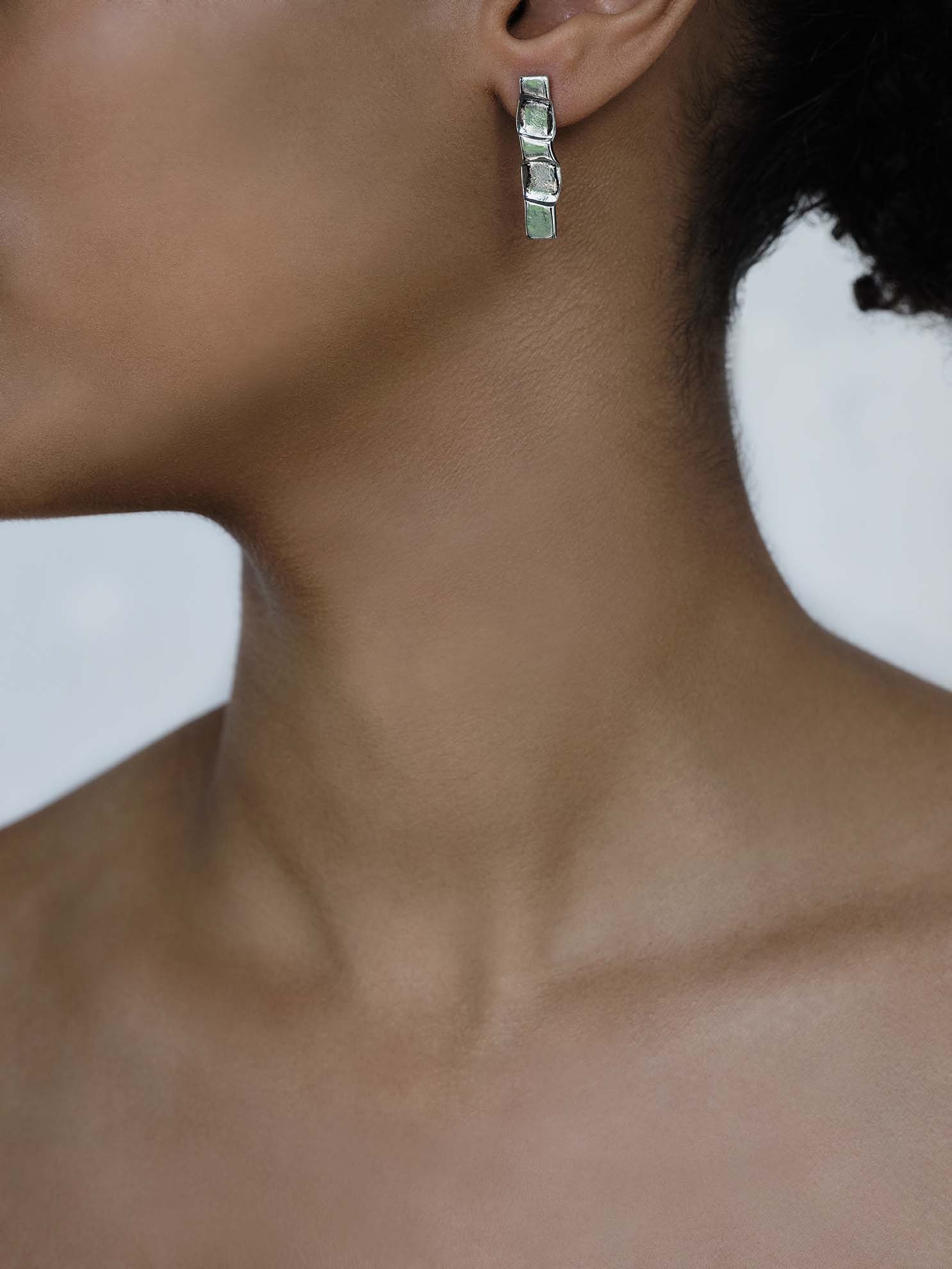 olong ark (s) , earrings , silver