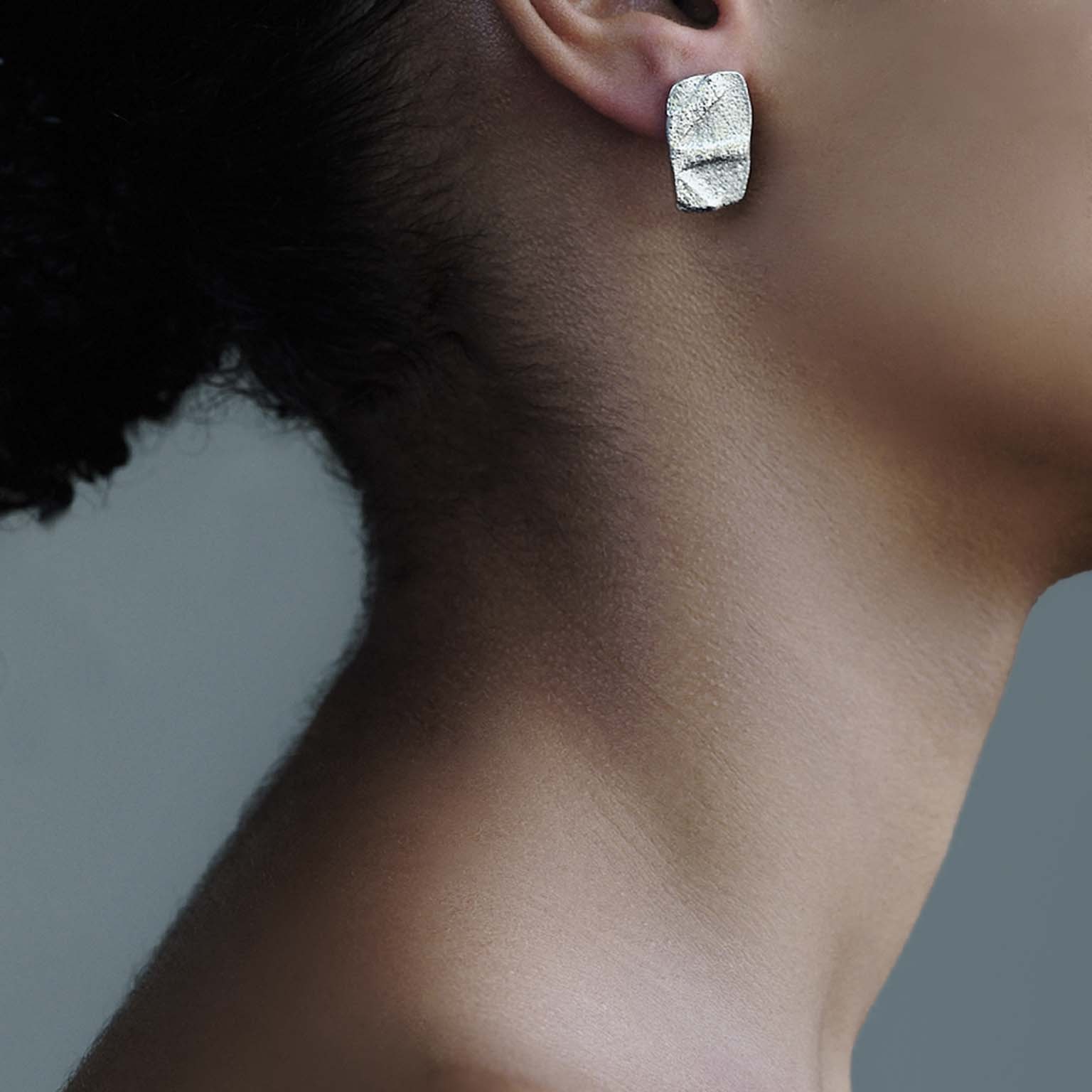 left r , earrings , silver