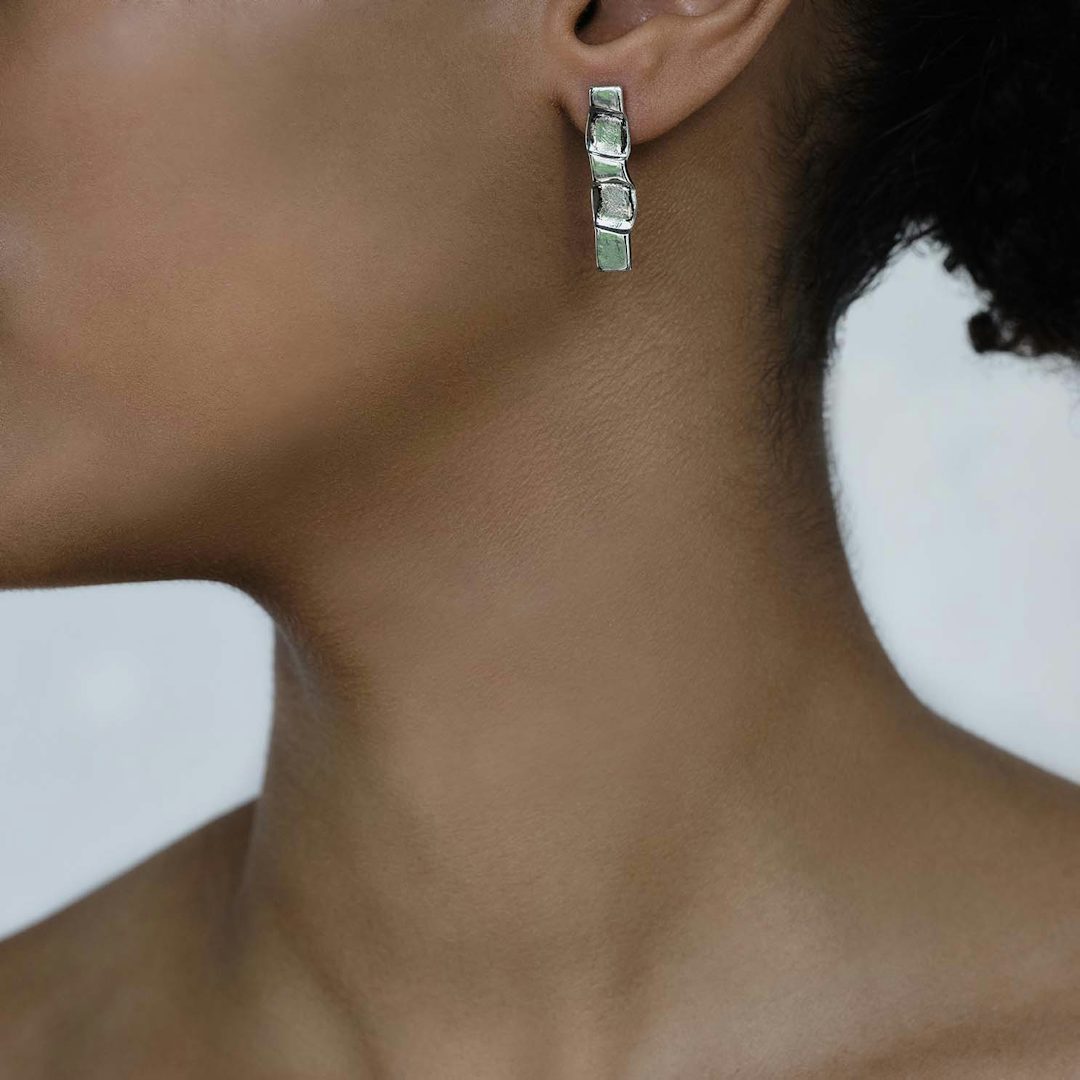 olong ark (s) , earrings , silver