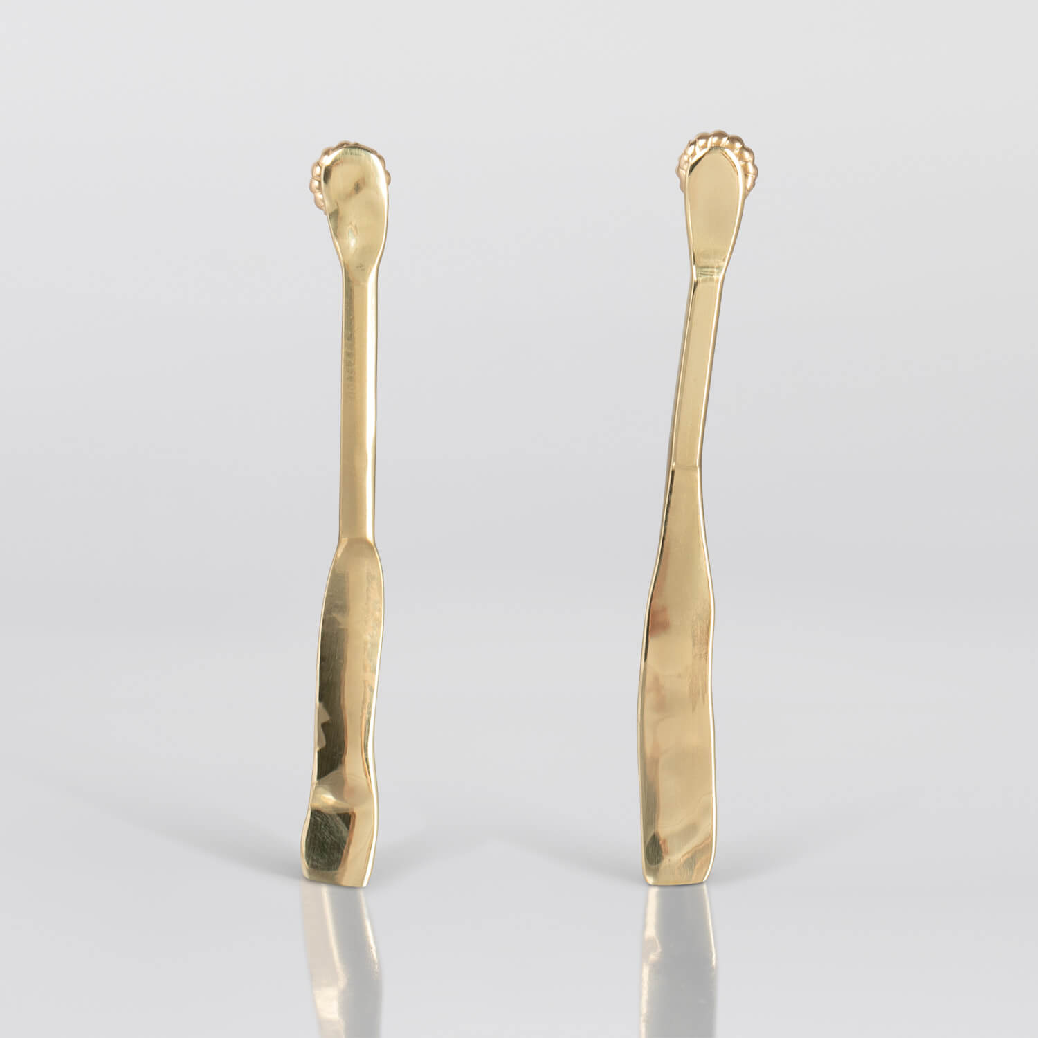 MIRR_FLAT_EARRINGS_FRONT_BRASS_WEB.jpg