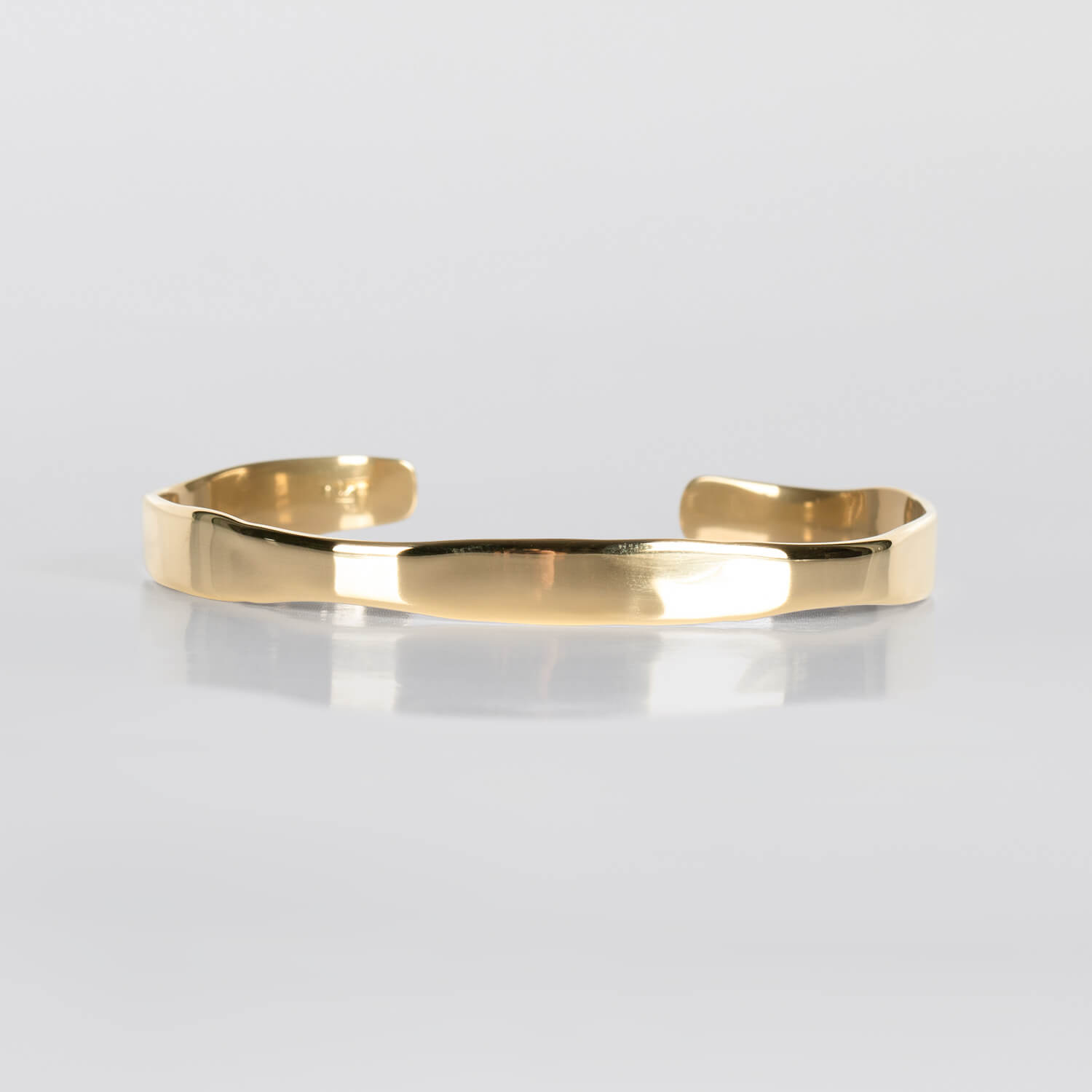 MIRR_FLOW_BRACELET_FRONT_BRASS_WEB.jpg