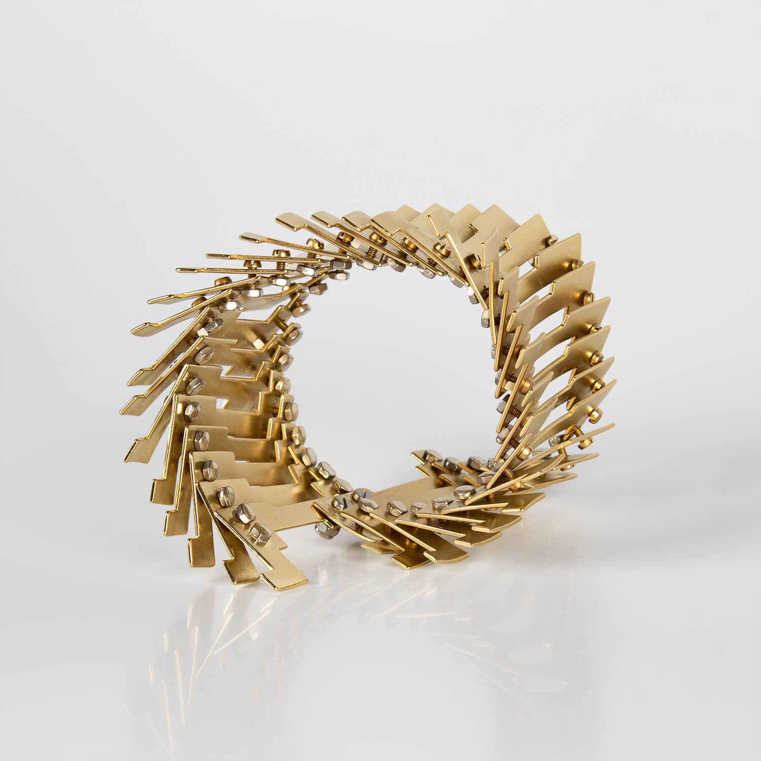 REFORM_SPINE_BRACELET_SIDE_BRASS_STAINLESS_STEEL_WEB